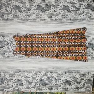 Black and Orange Sleeveless Midi Sheath Dress for Resort Wear